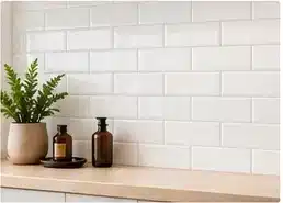 White subway wall tiles with a neat horizontal brick pattern